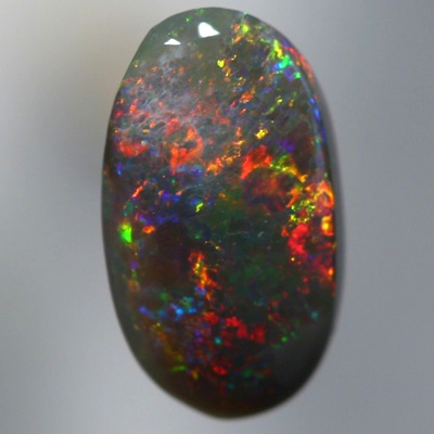 SOLID BLACK OPAL Bright sparkling fire red and copper orange